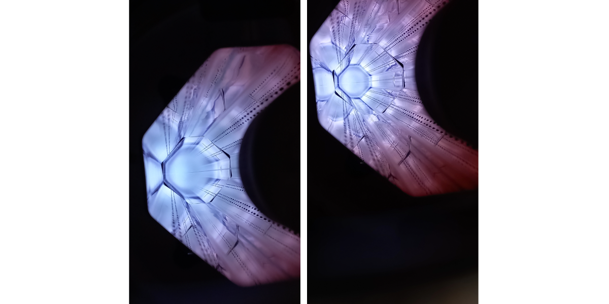 moon-shaped view of inside of beam screen, purple-blue colour